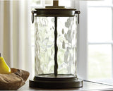 Signature Design by Ashley Tailynn Modern 25.25" Glass Table Lamp with Hardback Shade, Clear