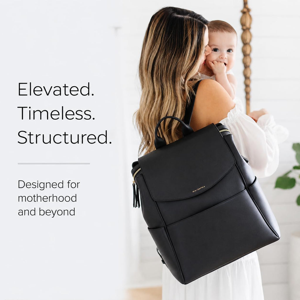 Leather Diaper Bag Backpack with USB Charging port, Changing Pad, Stroller Straps (Black Olivia)