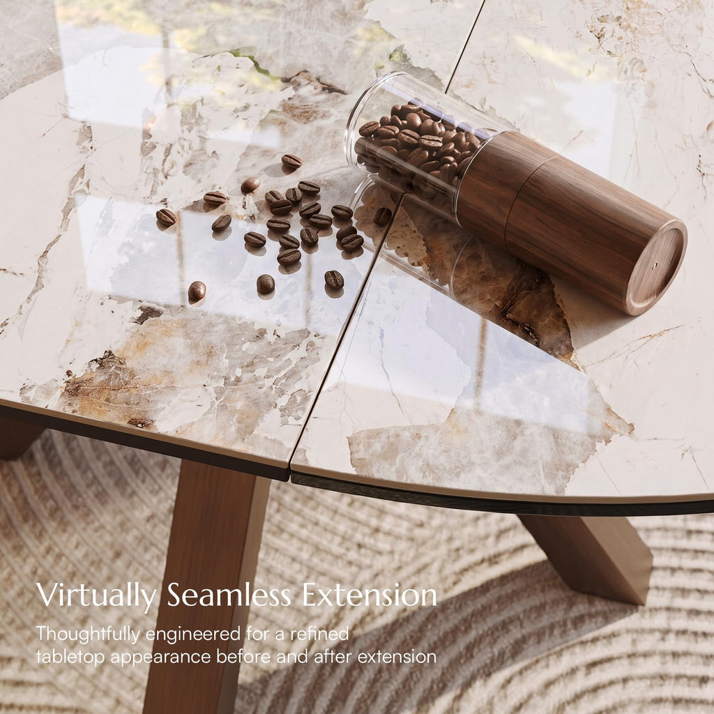 Modern Extendable Dining Table, 47" to 63" Round to Oval Sintered Stone Kitchen Table with Carbon Steel Pedestal Base