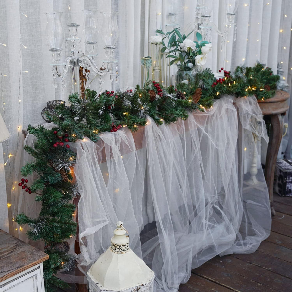 Pre-Lit Artificial Christmas Garland, 9 Feet, 50 Warm White Lights, Decorated with Pine Cones and Berry Clusters
