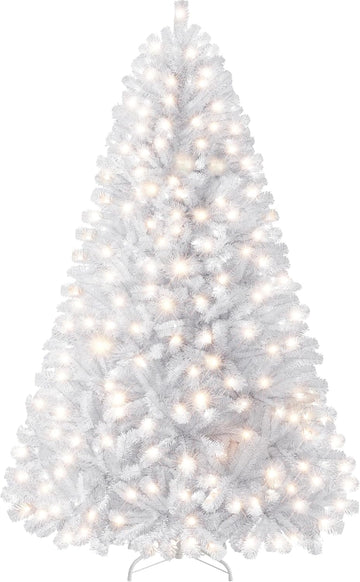 7.5ft Prelit Artificial Christmas Tree, 550 Warm Lights, White | 1354PVC tips fluff into an even, layered shape on a