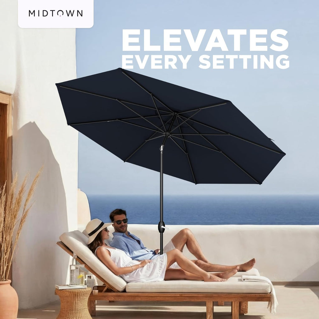 The Lean 9 Ft Patio Umbrella with 10-Year-No-Fade Acrylast Acrylic Fabric, Auto-Tilt and 8 Reinforced Ribs Pool