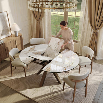 Modern Extendable Dining Table, 47" to 63" Round to Oval Sintered Stone Kitchen Table with Carbon Steel Pedestal Base