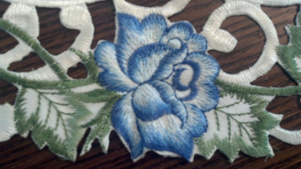 Round Doily with a Blue Rose on Ivory Material, Size 7 inches
