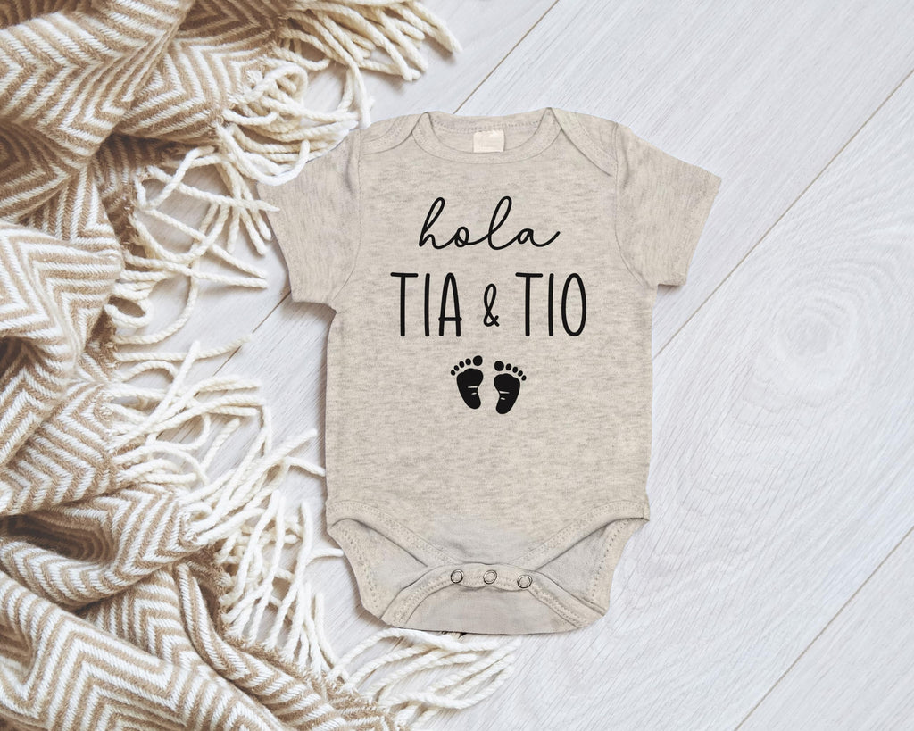 Hola Tia and Tio Pregnancy Announcement Infant Bodysuit for Aunt and Uncle | Spanish New Baby Gifts for Brother and