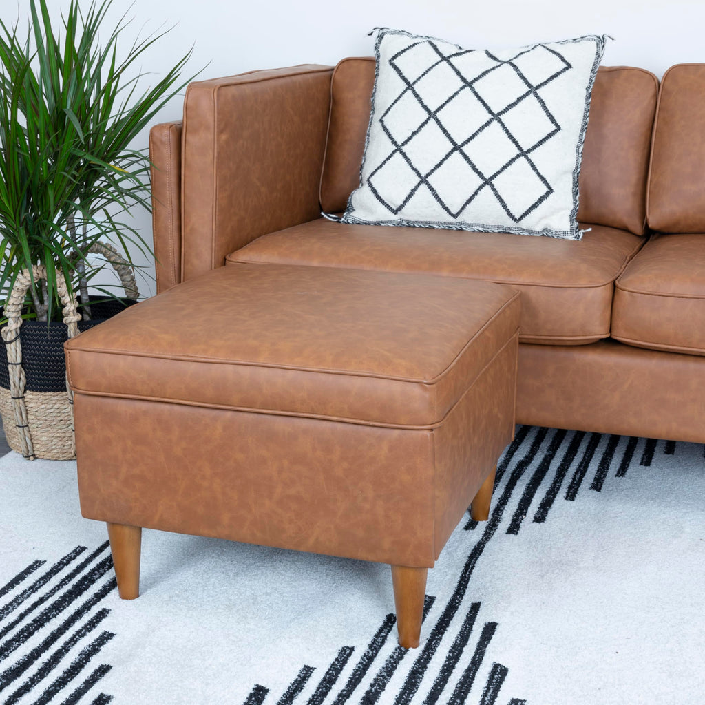 Atley Upholstered Modern Ottoman with Storage and Solid Wood Legs, Cognac Vegan Leather