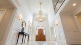 Gold Maria Theresa Empress crystal chandelier in tall two-story foyer