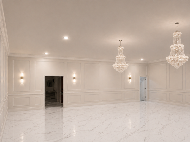 French Empire crystal chandeliers in a white marble ballroom entryway